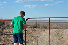 Boy Opening Farm Gate Stock Photography Boy Opening Farm Gate Stock Photography