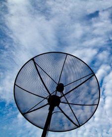 Satellite Dish In Blue Sky Stock Image