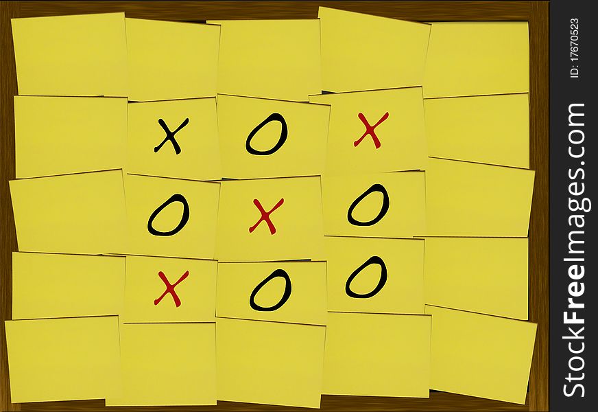 Tic-Tac-Toe game on yellow notes