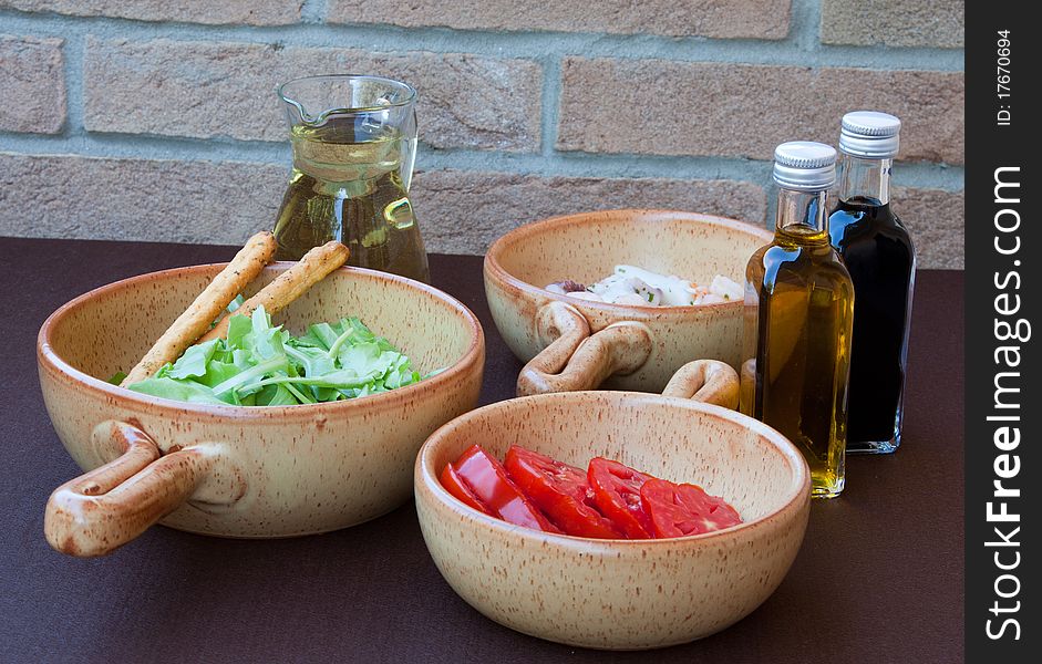 Shrimp, salad, tomato and wine. Shrimp, salad, tomato and wine