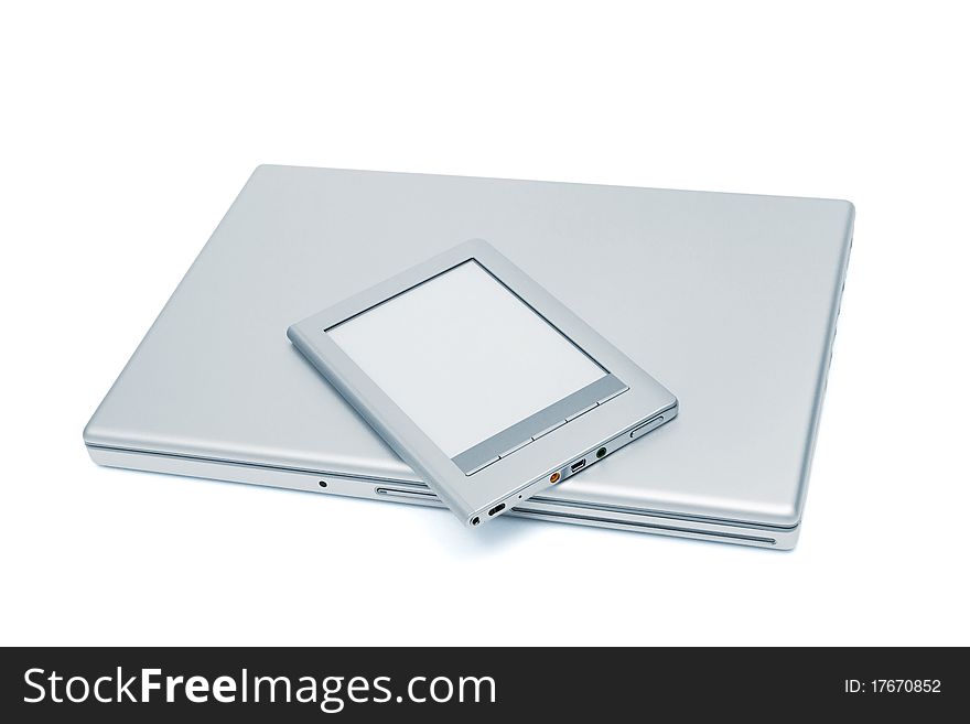 Laptop and e-book on a white background