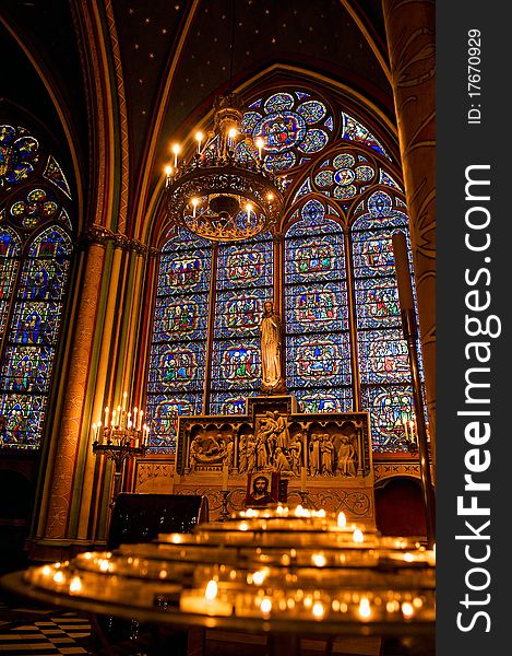 Candles Lit In The Notre-Dame Cathedral