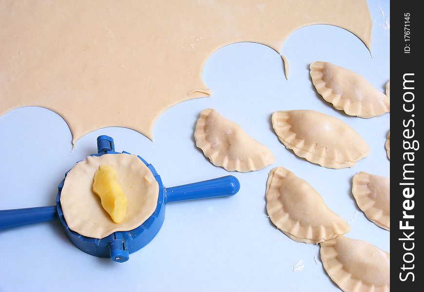 Homemade dumplings on blue table