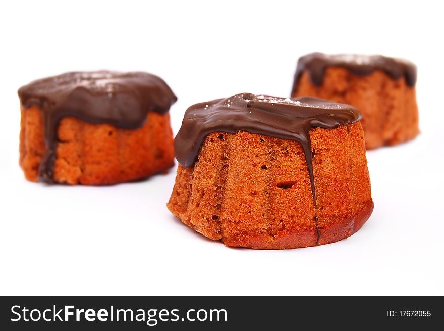 Chocolate cupcakes isolated on the white background