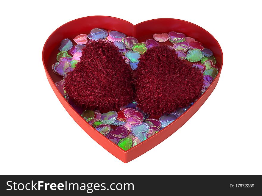Valentine day heart shaped wool balls in red tray with sparkles. Valentine day heart shaped wool balls in red tray with sparkles