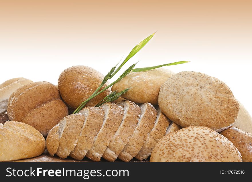 Fresh bread with wheat stem sprinkle with flour. Fresh bread with wheat stem sprinkle with flour
