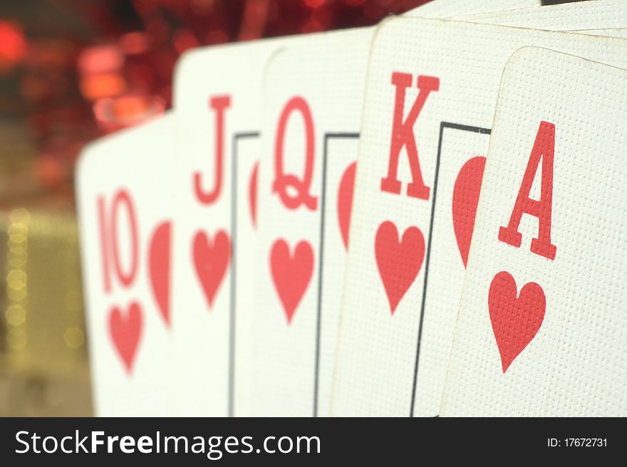 Close up of a straight poker hand with shallow depth of field. The ace is in sharp focus. Close up of a straight poker hand with shallow depth of field. The ace is in sharp focus.