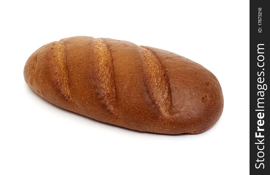 Fresh-baked long loaf on a white background