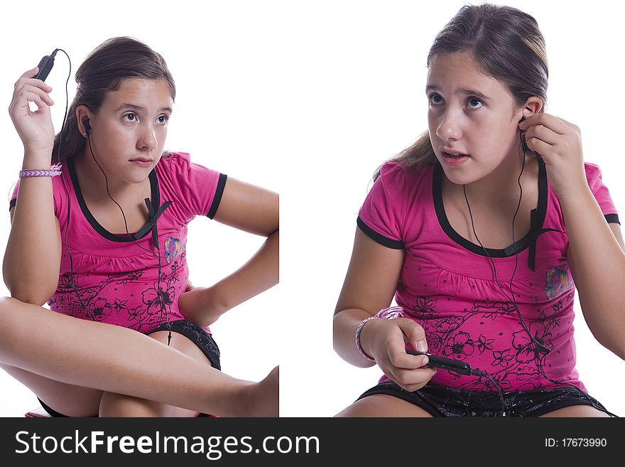 Young girl listening to music with headphones on her ears