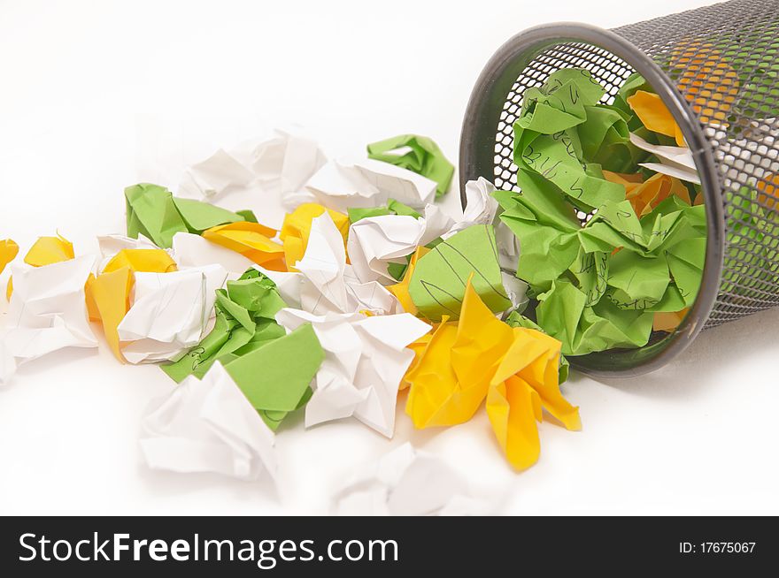 Turned over a metal basket full of paper thrown. Turned over a metal basket full of paper thrown