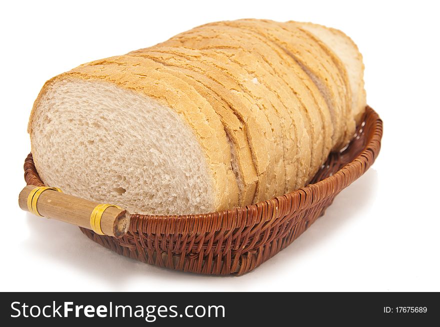 Bread cut into pieces in a wicker basket