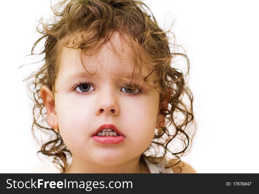 Little curly-haired girl, white background, portrait