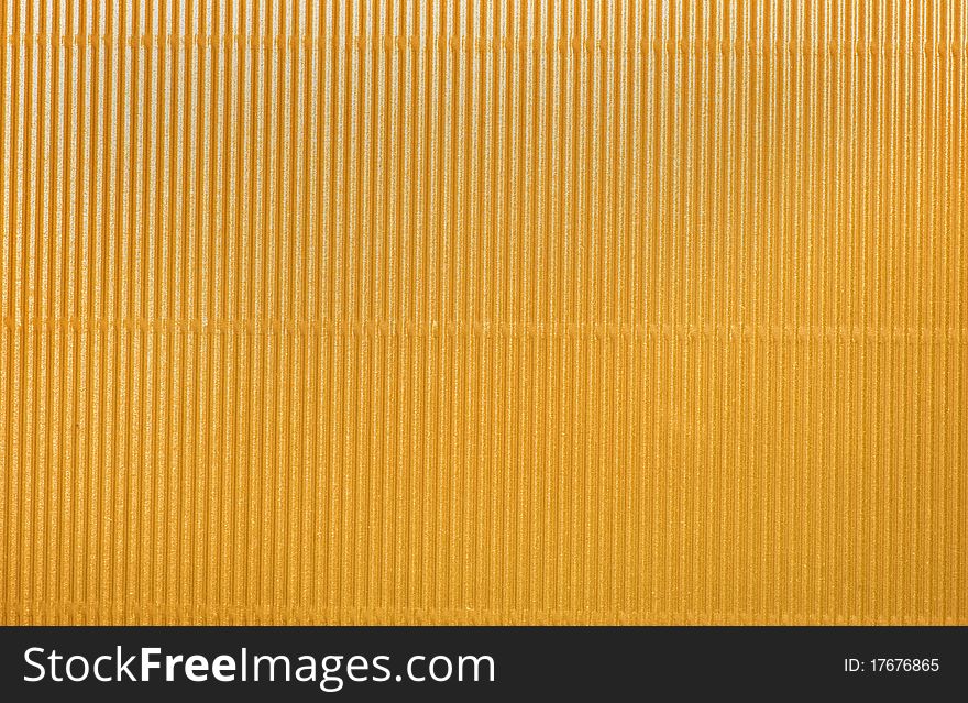 Yellow corrugated cardboard placed horizontally