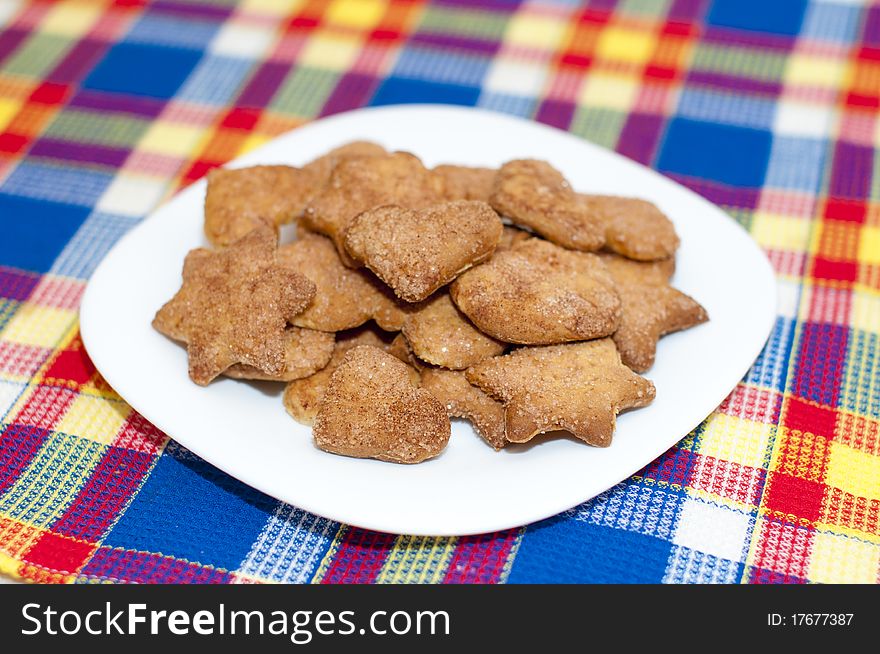 Cookies of different forms on a plate. Cookies of different forms on a plate