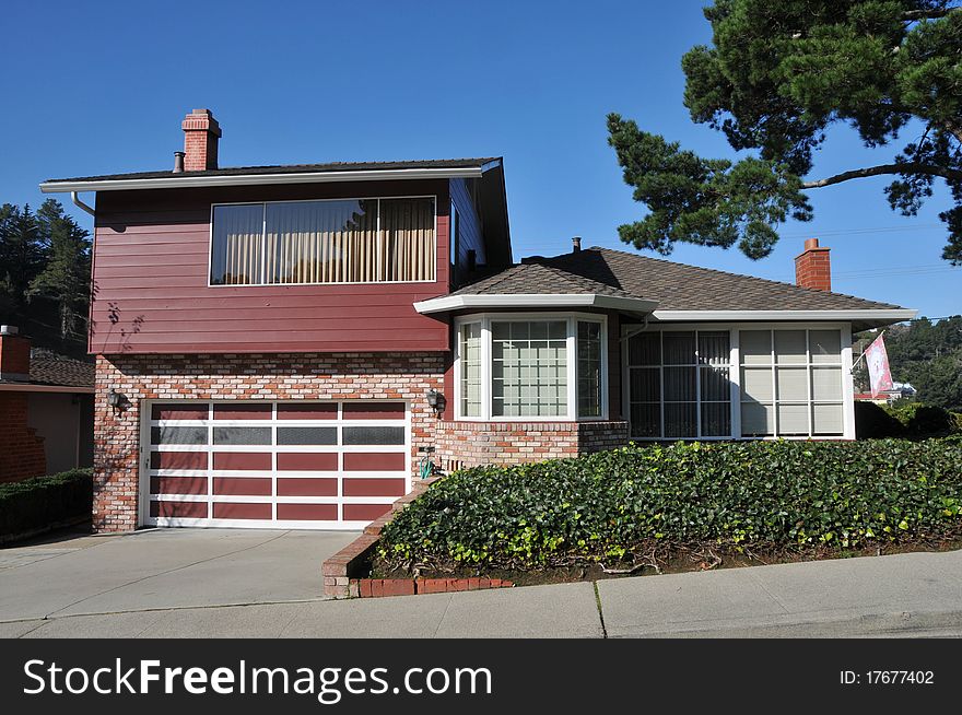 House surrounded by trees and grass