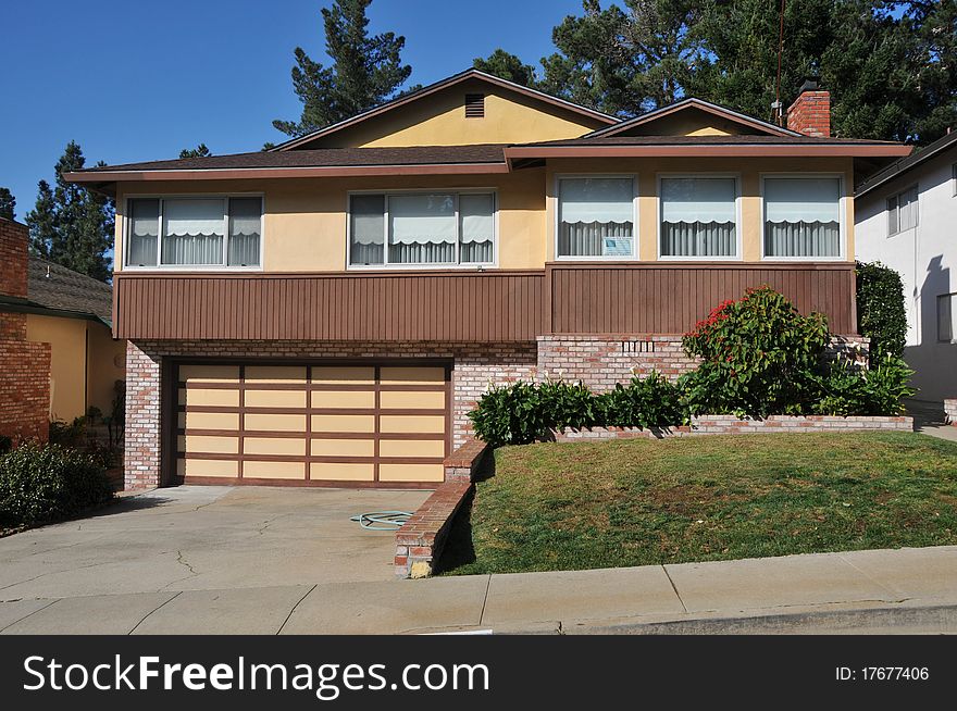 House Surrounded By Trees And Grass