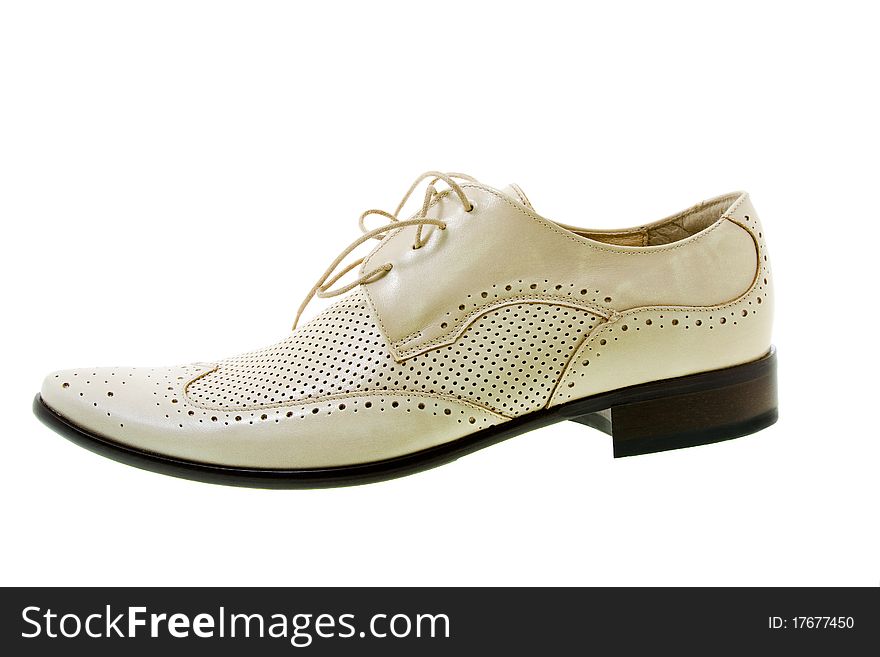 White leather shoes with holes (for a summer season, isolated). White leather shoes with holes (for a summer season, isolated)