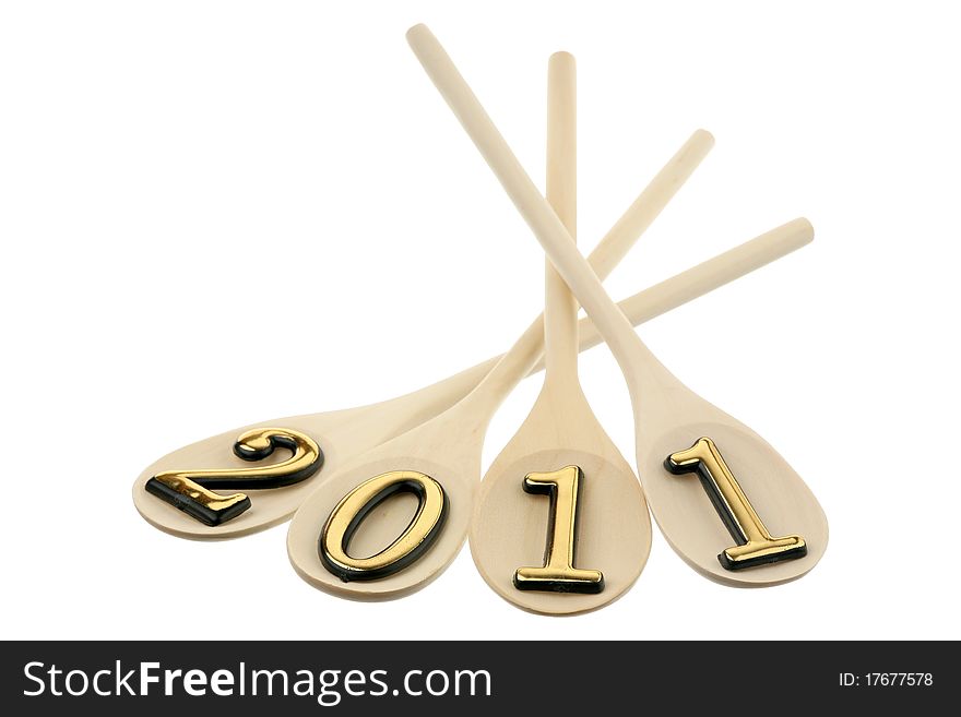 Number 2011 on spoons are isolated on a white background