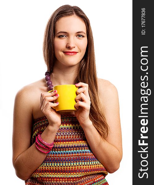 Beauty young woman with yellow cup