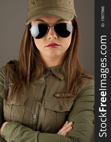 Beautiful woman in military urban clothes