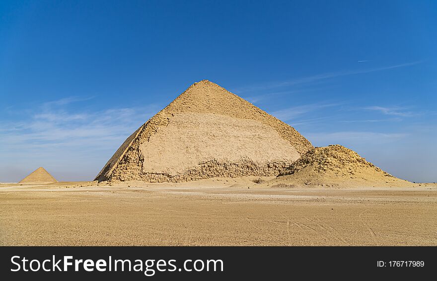 The Bent Pyramid Is An Ancient Egyptian Pyramid Located At The Royal Necropolis Of Dahshur, Approximately 40 Kilometres South Of