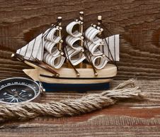 Compass, Rope And Model Classic Boat Royalty Free Stock Photo Compass, Rope And Model Classic Boat Royalty Free Stock Photo