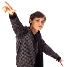 Stylish Young Man Points His Hands Up And Down Royalty Free Stock Images