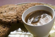 Coffee Cup And Chocolate Cookies Stock Images