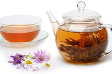 Teapot With Floral Brewed Tea And Flowers Royalty Free Stock Photo