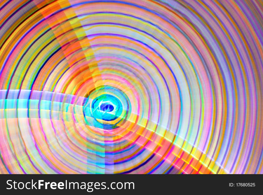 Abstract rainbow colored background in the shape of circles. Abstract rainbow colored background in the shape of circles