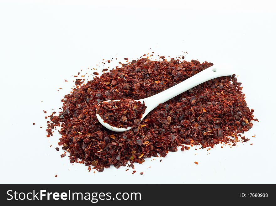 Pile of Hot Red Chilli pepper with spoon