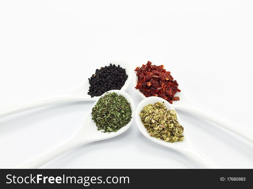 Various spices isolated on white