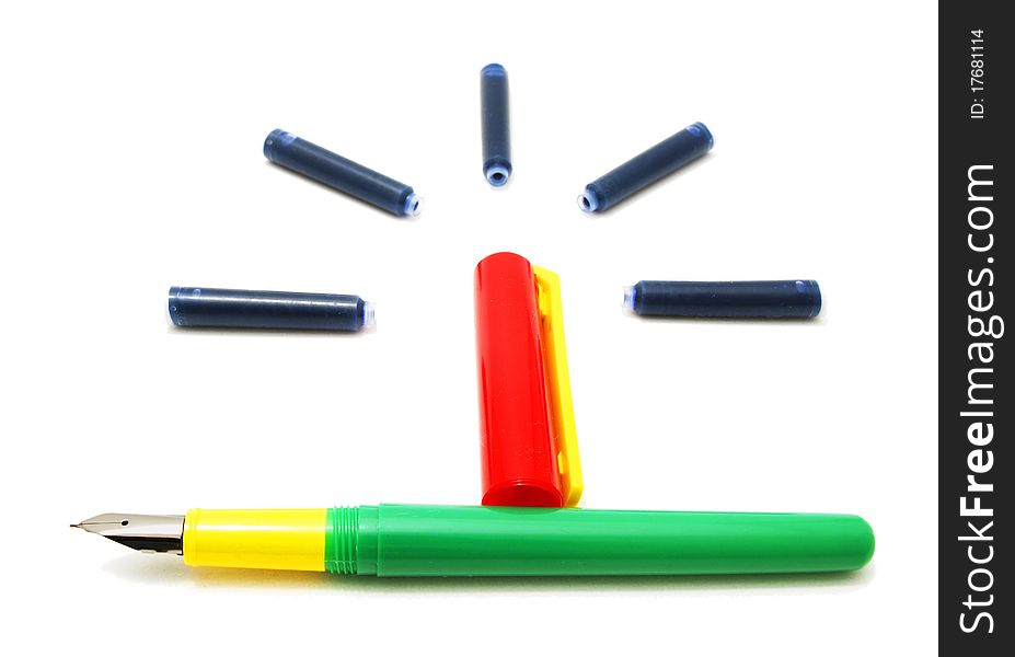 Colored pen and cartridges on white background