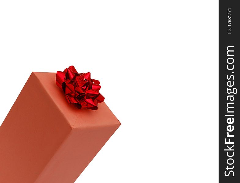 Close up of gift box with red bow isolated on white background. Close up of gift box with red bow isolated on white background.