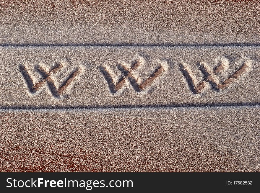 Www handwritten with a finger in hoarfrost outdoors on a boat.