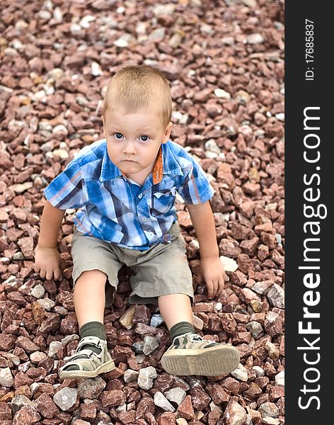 A boy on stones