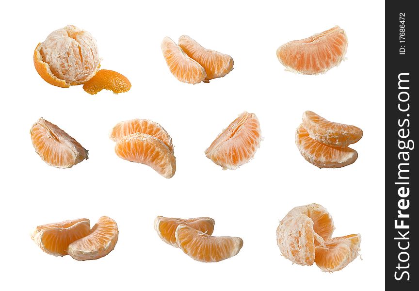 Some isolated pieces of the tangerine on the white background. Some isolated pieces of the tangerine on the white background