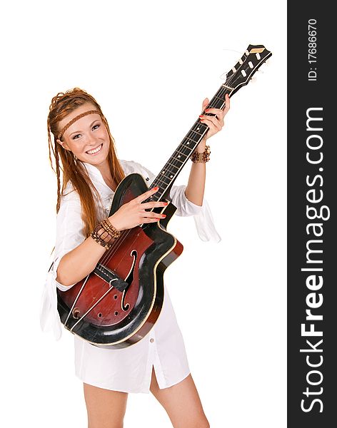 Young beautiful woman posing in studio with guitar. Young beautiful woman posing in studio with guitar