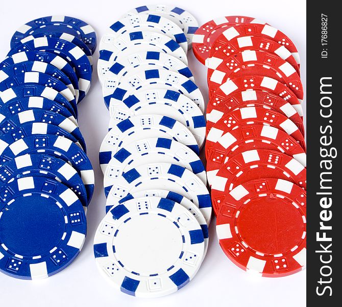 Photography of three line chips colored blue white and red. Photography of three line chips colored blue white and red