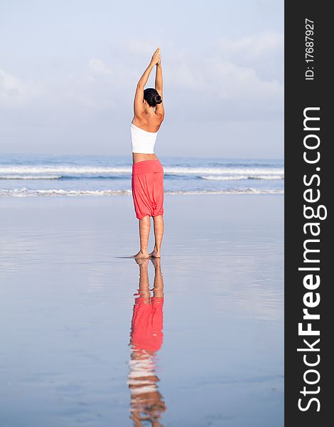 Relaxing exercising by the ocean