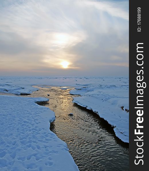 Non-freezing river fall into the lake