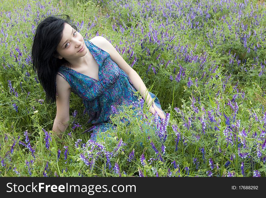 Beautiful Black Hair Girl in blue flowers