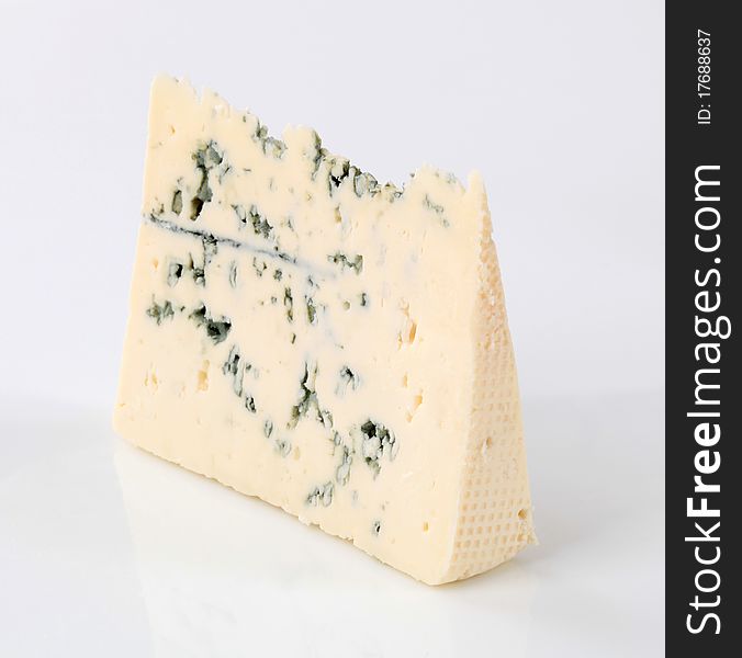 Blue cheese with veins of green mold