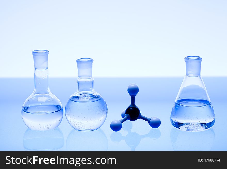 Laboratory glass. Glassware on the blue background.