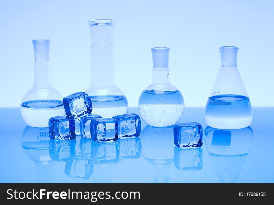 Laboratory glass. Glassware on the blue background.