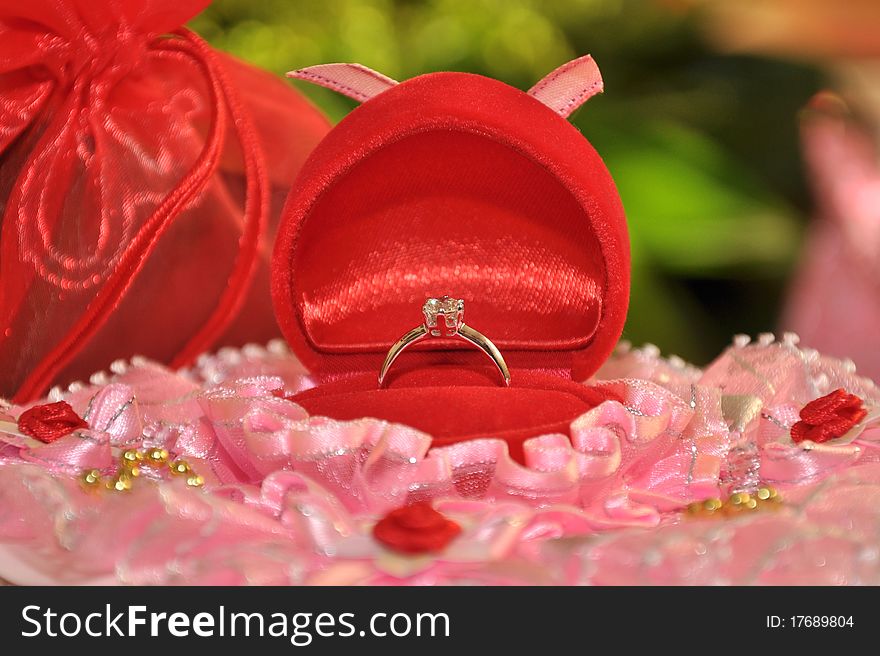 Beautiful Wedding Ring over Red Silk Background. Beautiful Wedding Ring over Red Silk Background