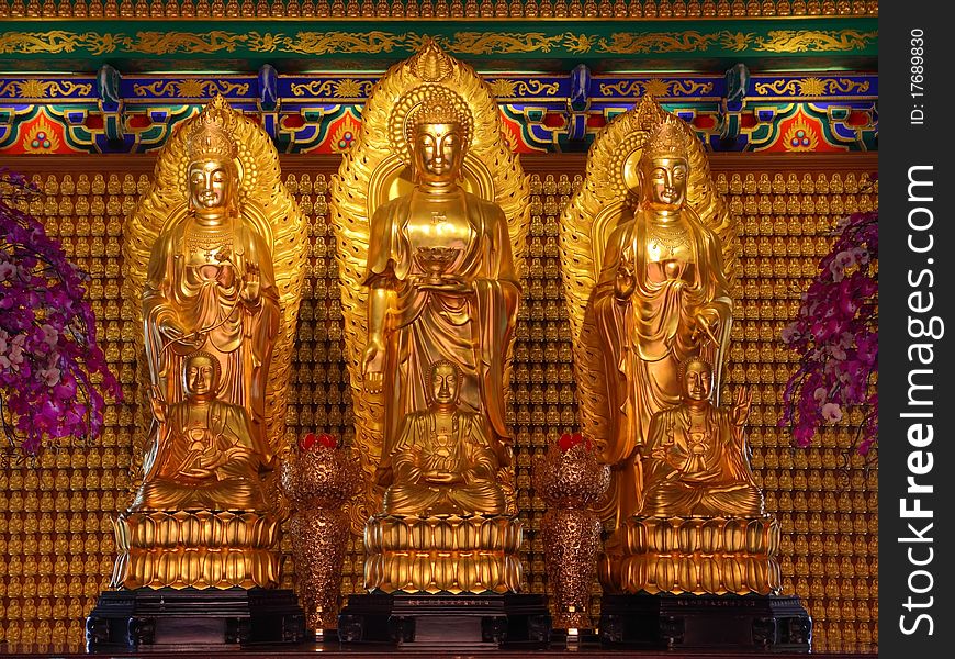 Three Golden Buddha in Chinese style. Three Golden Buddha in Chinese style