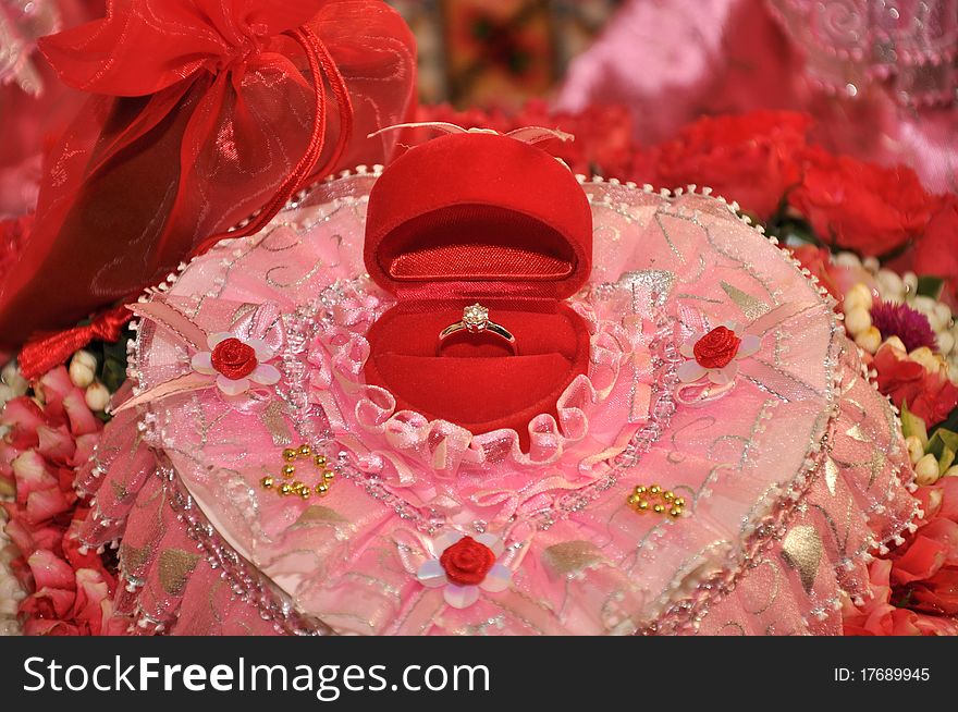 Beautiful Wedding Ring over Red Silk Background. Beautiful Wedding Ring over Red Silk Background