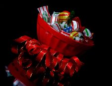 Red Bowl With Christmas Candy And Ribbon Angled Stock Photo Red Bowl With Christmas Candy And Ribbon Angled Stock Photo