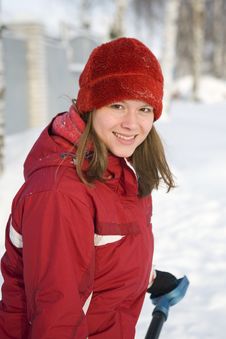 The Girl In A Winter Red Cap Smiles Stock Photography The Girl In A Winter Red Cap Smiles Stock Photography